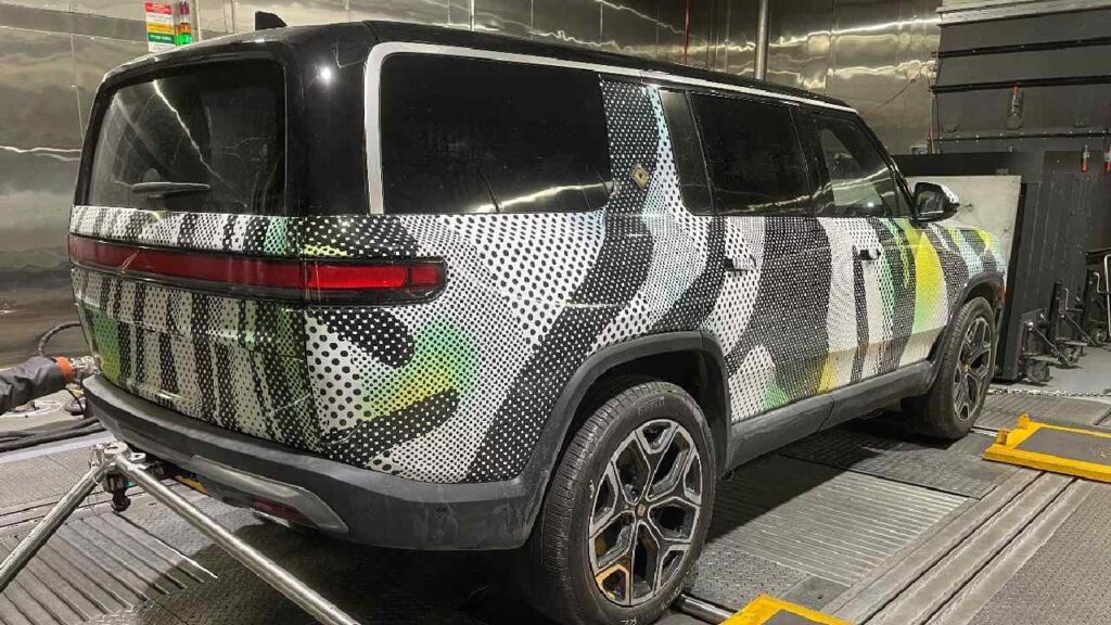 2025 Rivian R1S Camouflage Rear Three Quarters