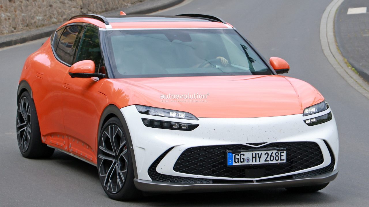 Genesis GV60 Magma Spy Shot Front Three Quarters